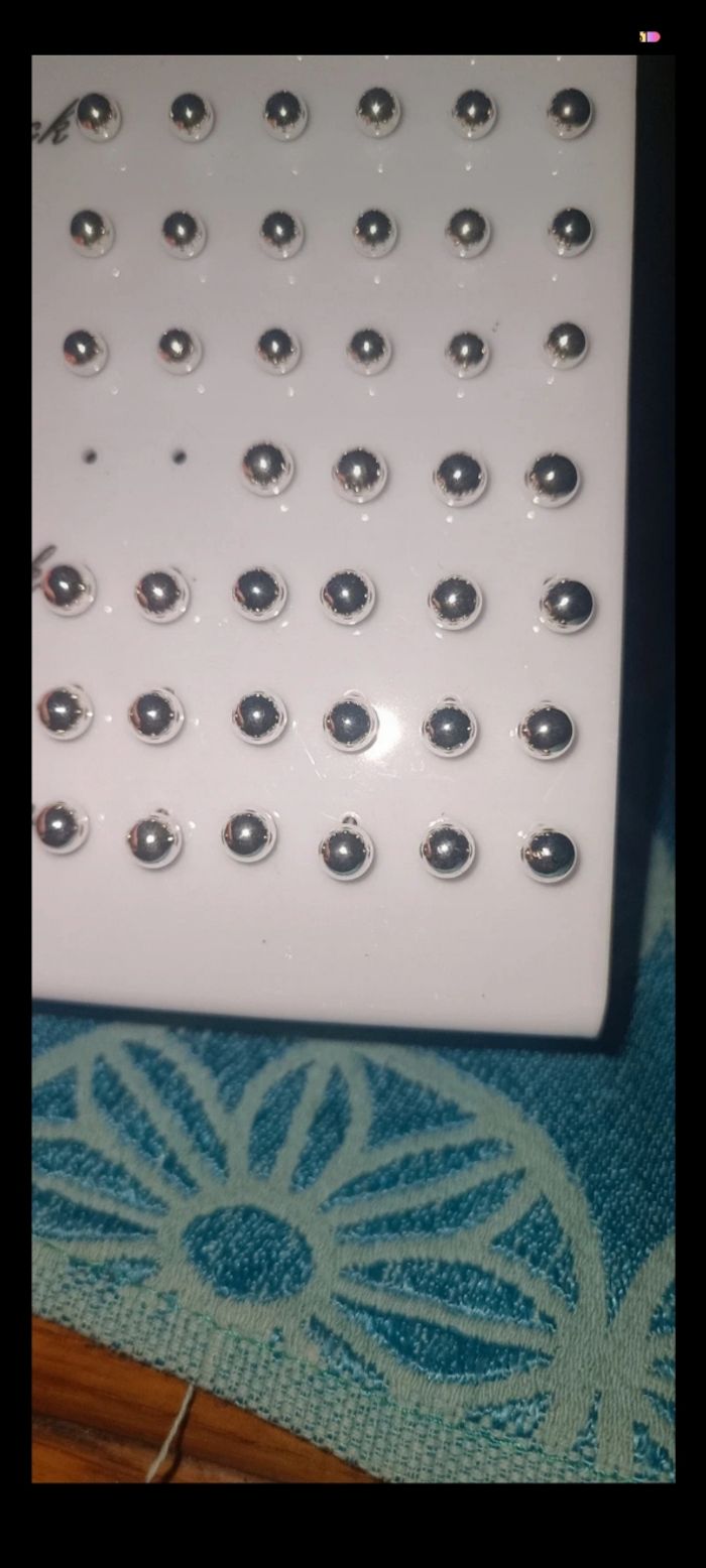 Boucle d'oreille argenté - photo numéro 4