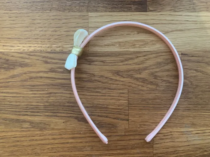 Serre tête rose avec noeud