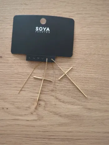 Boucles d' oreilles pendantes croix soya fashion neuve