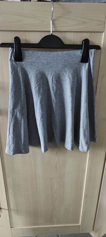 Jupe patineuse grise Kiabi 18 ans