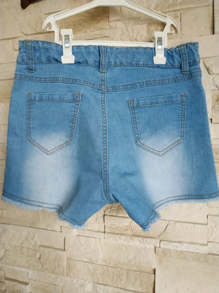 T-shirt fille bleu clair délavé tbe 14 ans - photo numéro 2