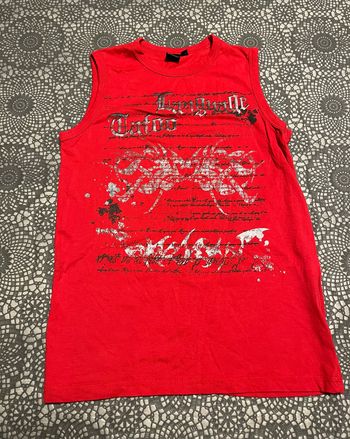 Teeshirt sans manches taille 12 ans