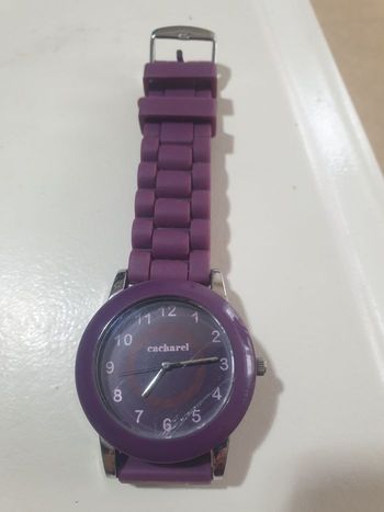 Montre violette cacharel