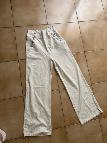 Pantalon large en bas avec fausse poche