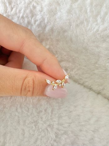 Piercing branche de feuilles brillantes, doré