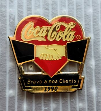 Rare. Pin's coca cola bravo à nos clients 1991