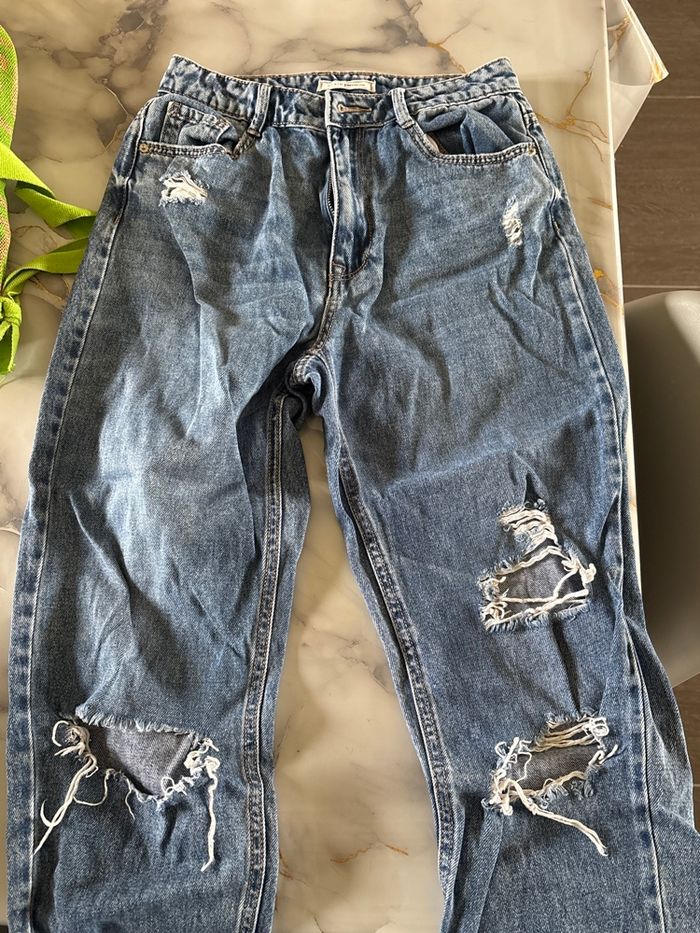 Pantalon bleu trouer