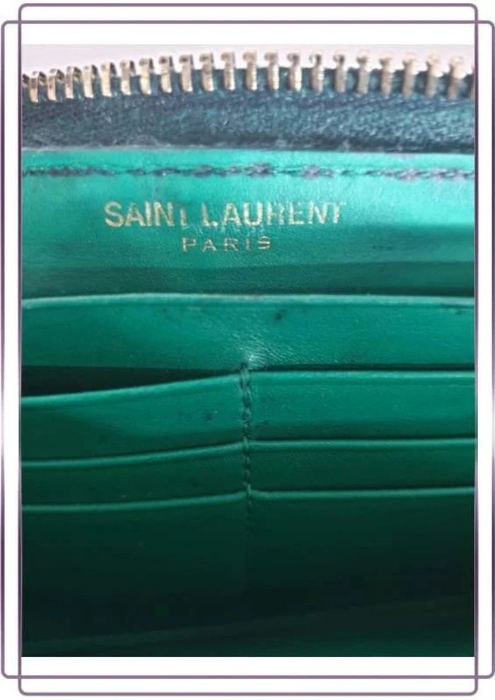Portefeuille Saint Laurent vintage en cuir, bon état mais quelques  traces d'usures, 20x10cm - photo numéro 5