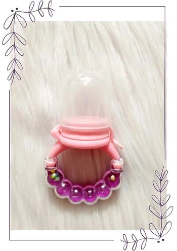 Tétine hochet pour initiation au goût des fruits ou légumes