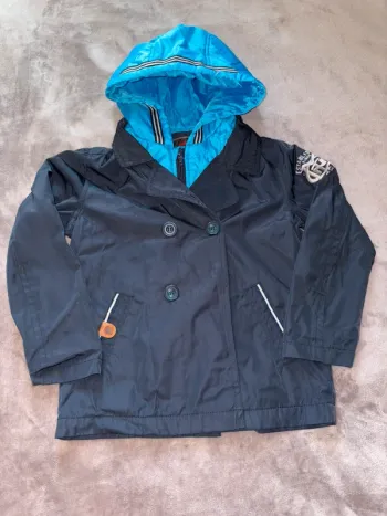 Blouson imperméable garçon catimini taille 6 ans en très bon état. Bleu ciel et bleu marine.