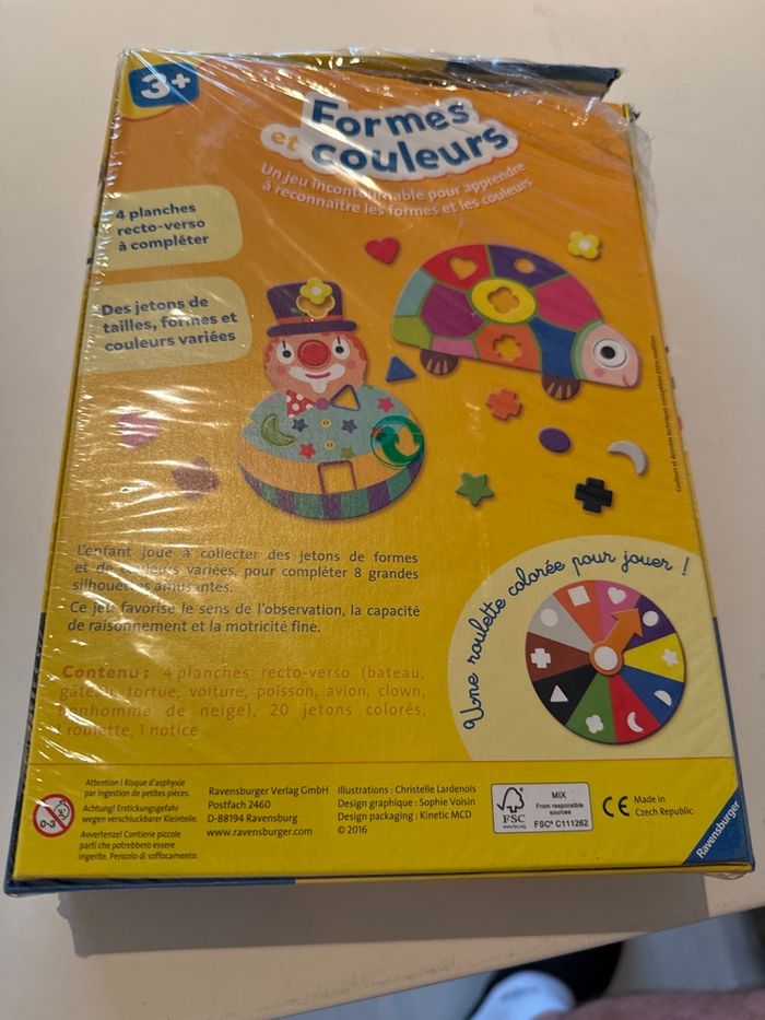 Ravensburger forme, et couleur boîte très abîmée neuf - photo numéro 2