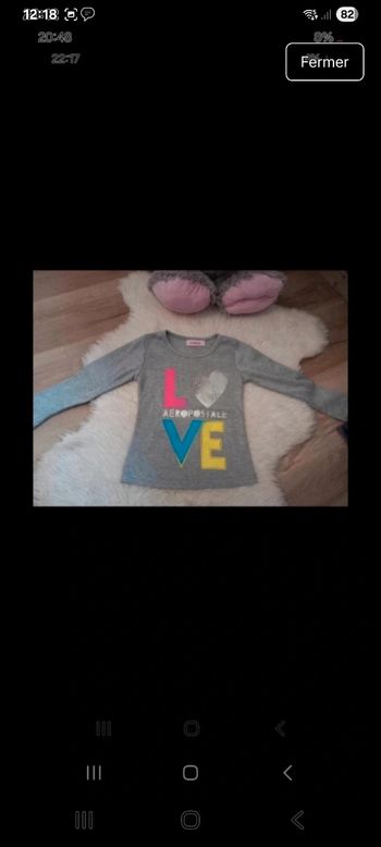 Très jolie pull love 4 ans