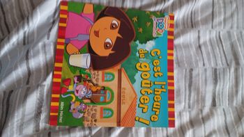 Livre dora l'exploratrice c'est l'heure du gouter