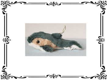 Peluche dauphin gris.