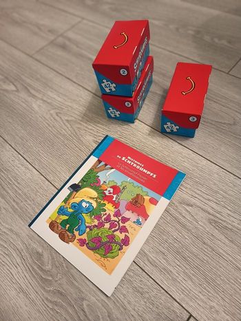 Livre + puzzles Schtroumpfs, Mc Do, 1€ l'unité (le 2ème à 0,50€)