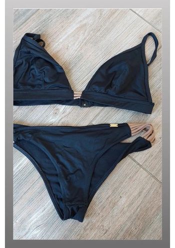 Maillot de bain deux pièces noir et marron, plusieurs traces d'usures  - Taille 38 Banana Moon