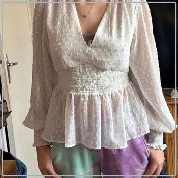 Blouse semi  transparente taille  40 marque amisu
