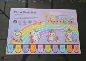 ● 12 à 36 mois ● Tapis piano Licorne Neuf