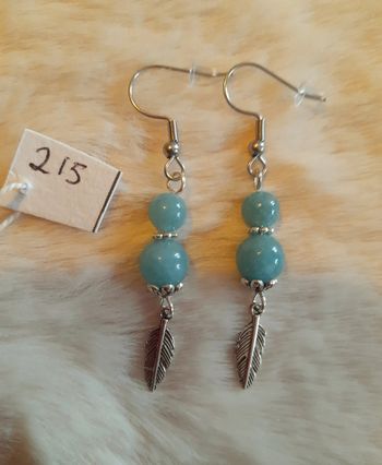 Boucles d'oreilles plume perles couleur turquoise