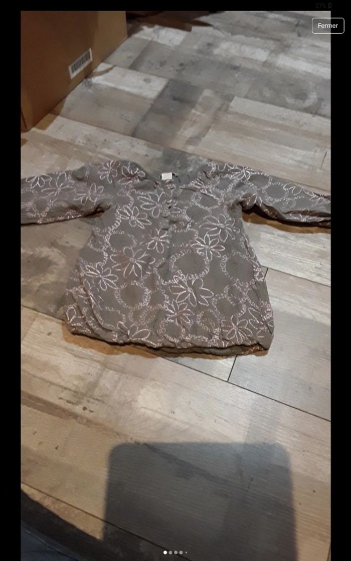 Haut manche longue avec  bouton sur le devant