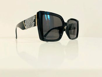 Lunette de soleil femme rectangulaire noire uvprotection catégorie 3