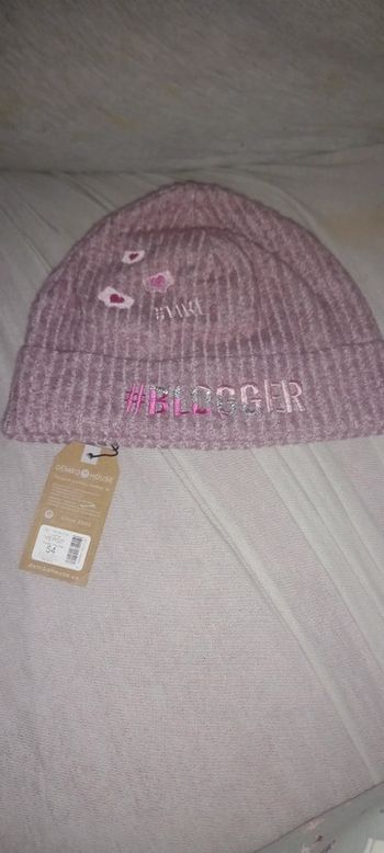 Bonnet t.54 environ 5 6 ans sans marque de bonne qualité