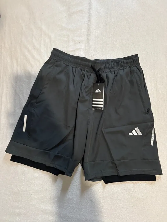 Short own the run spray dye 2-in-1 taille XL