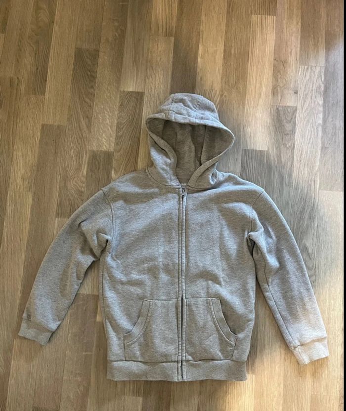 Gilet à capuche gris taille 9 / 10 ans