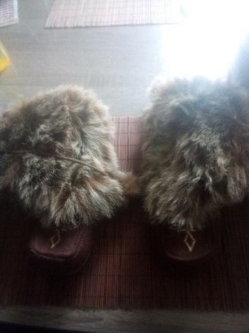 Bottines fausses fourrures et ponpoms