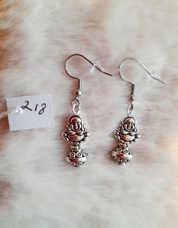 Boucles d'oreilles bouddha acier