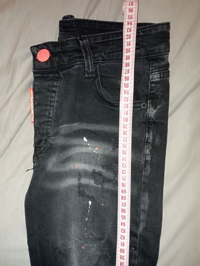 Jean effet "troué taché" - photo numéro 7