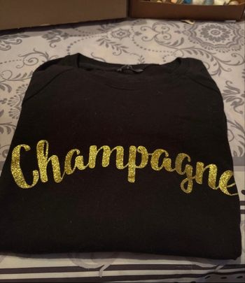 Pull écriture dorée 