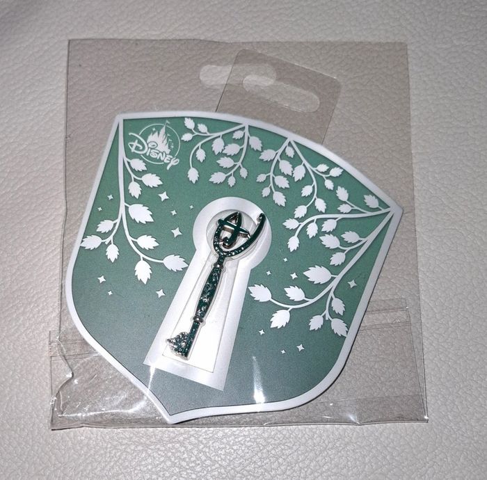 Pins cle d ouverture disney