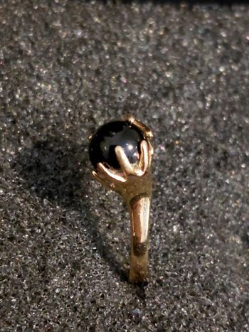 Bague Jordan doré et noir