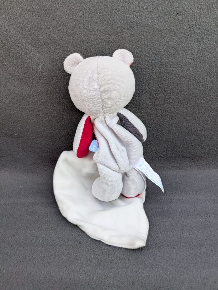 Doudou cajou ours mouchoir sucre d'orge Doudou cajou ours mouchoir
Sucre d'orge
Gris blanc et rouge - photo numéro 5