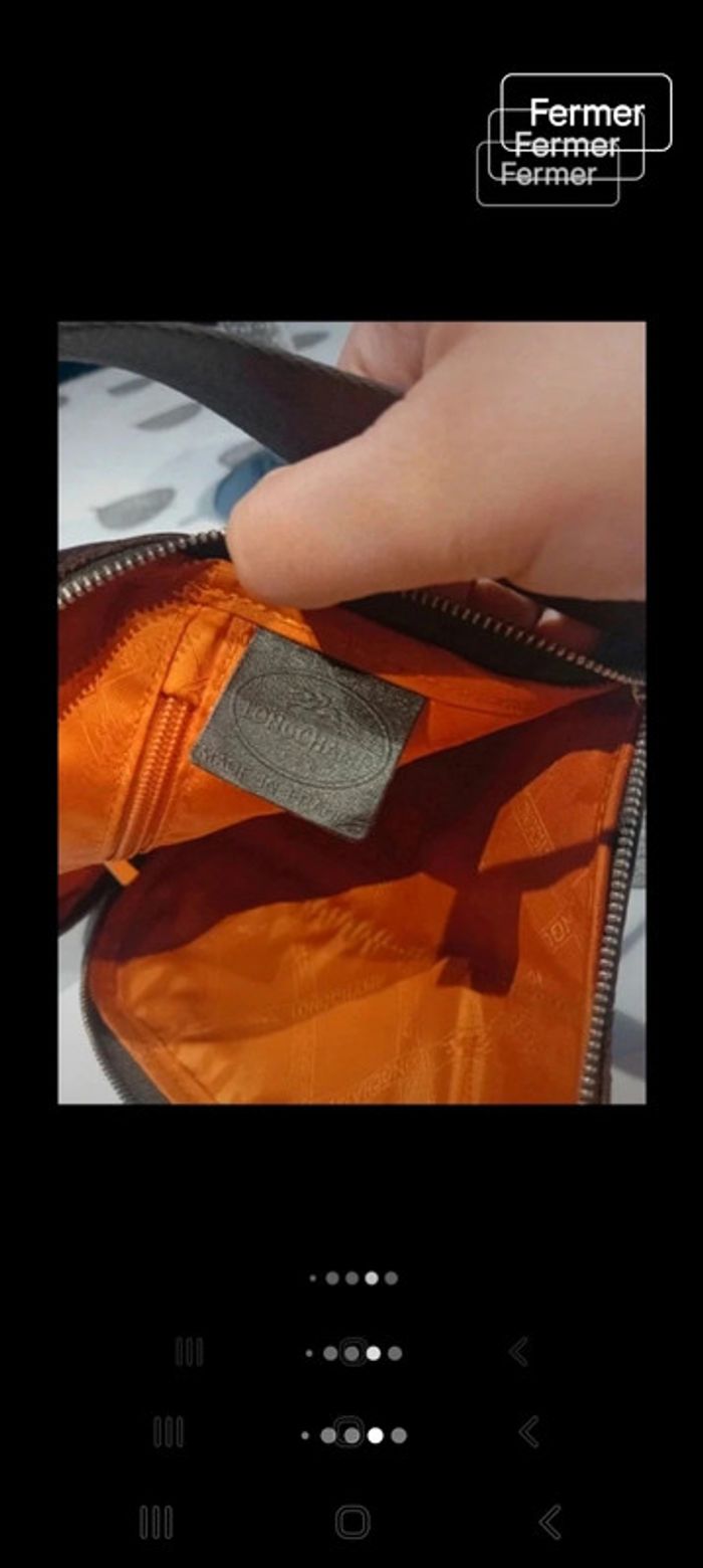 Pochette longchamp homme tt est visible sur les photos - photo numéro 8
