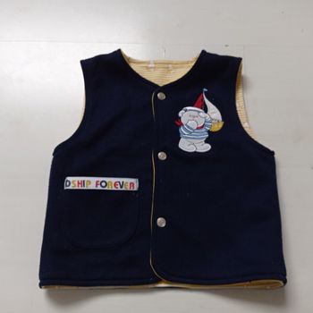 Cardigan sans manches réversible 2 ans