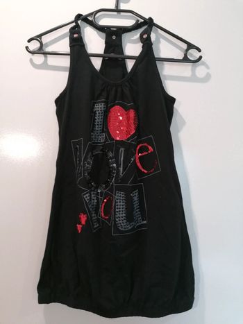 Très beau haut original avec strass