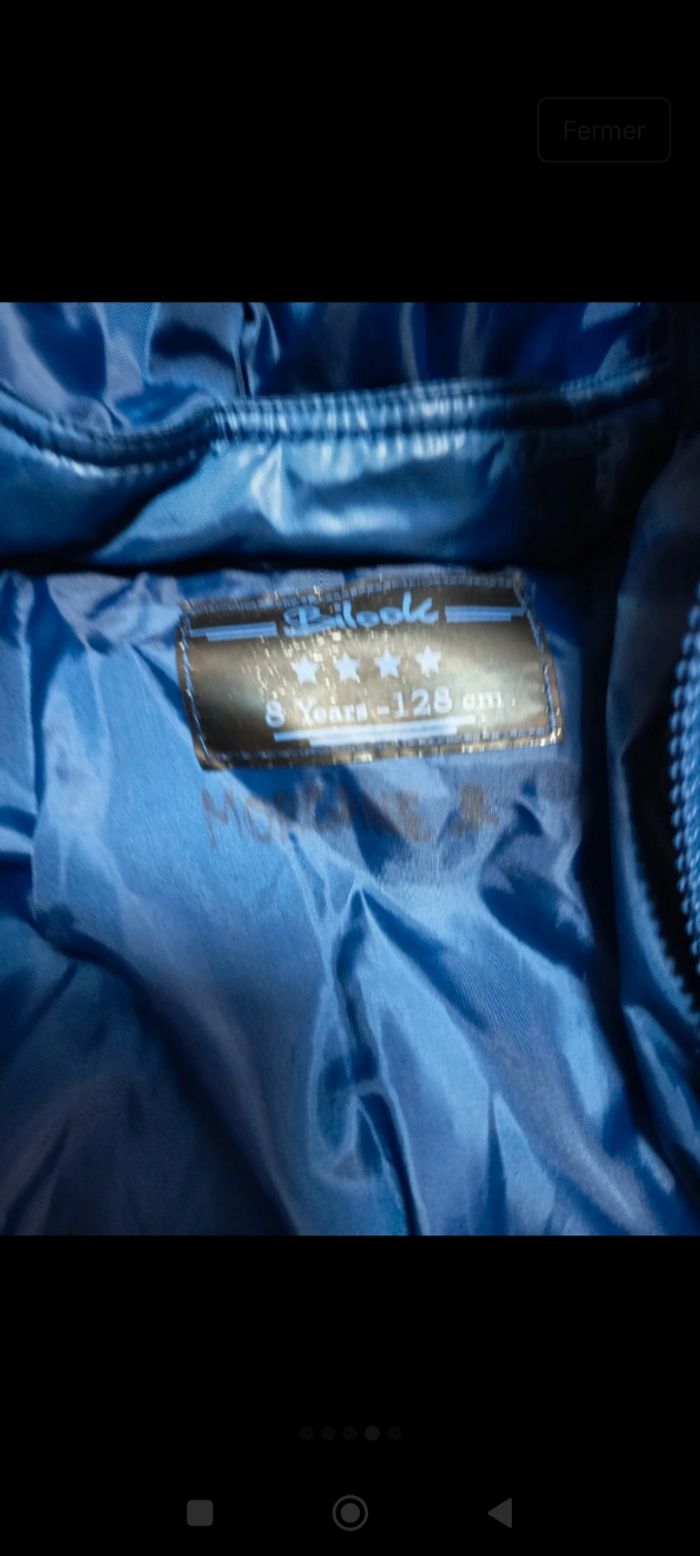 Doudoune bleu avec fourrure sur le bord de la capuche - photo numéro 4