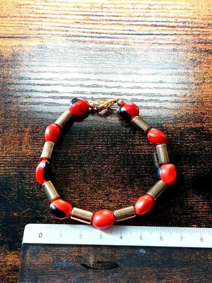 Magnifique bracelet en perles couleur doré et orange. - photo numéro 4