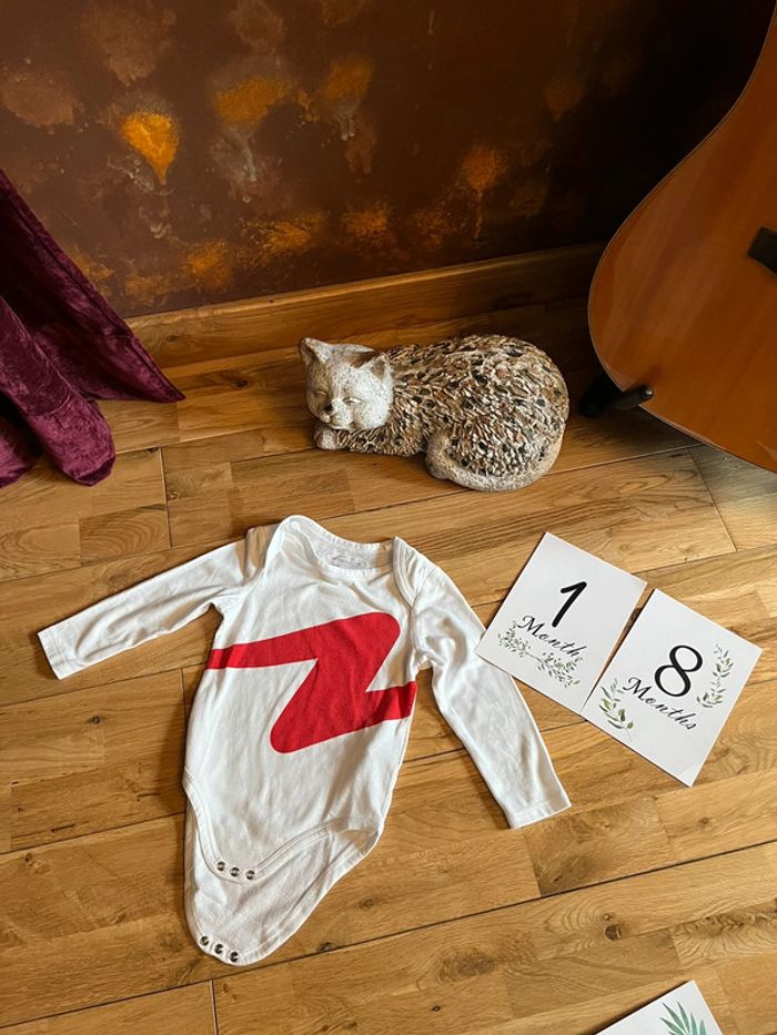 Body blanc et rouge très bon état damart thetmolactyl 18mois