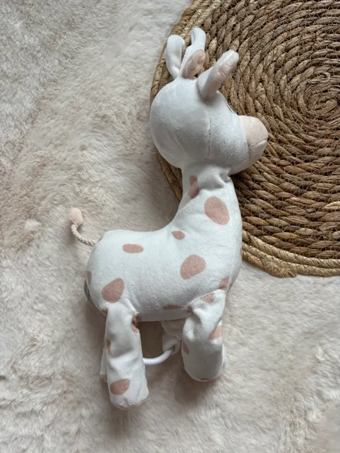 Peluche musicale girafe