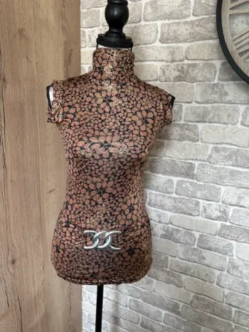Blouse sans manches à col roulé taille 34