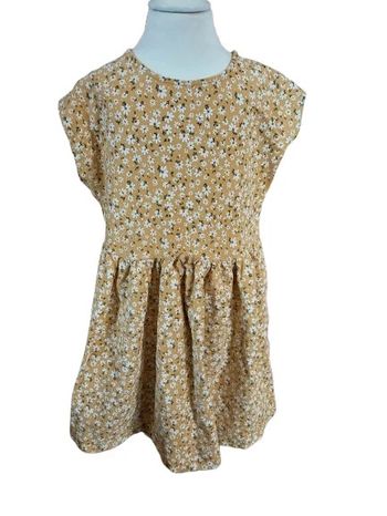 Robe couleur Moutarde avec des fleurs Taille 8 ans