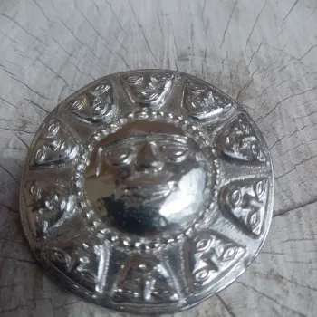 Broche vintage métal poli