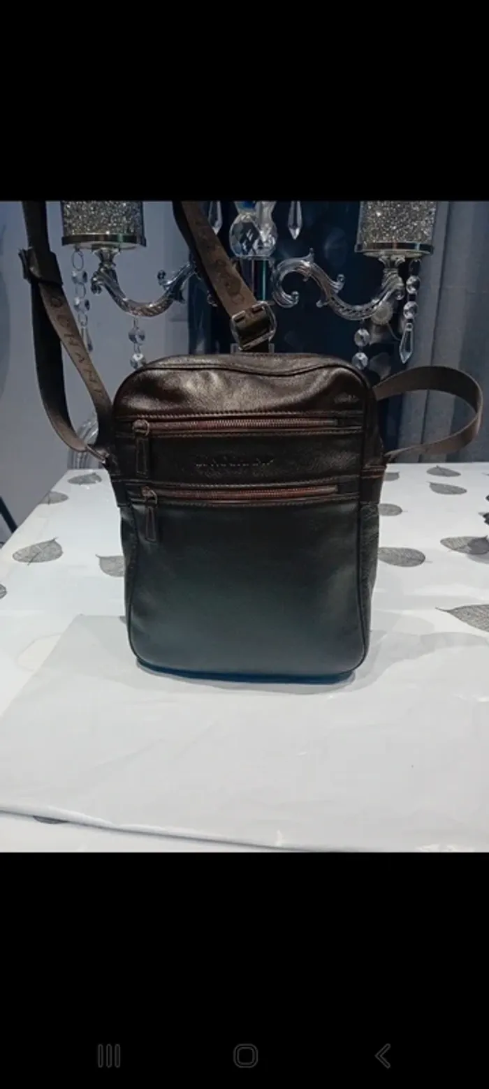 Pochette longchamp homme en cuir marron 25x21x5