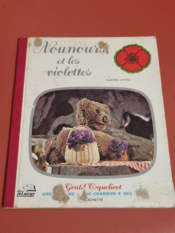 Livre vintage nounours et les violettes avec défaut: la couverture avant est abimée