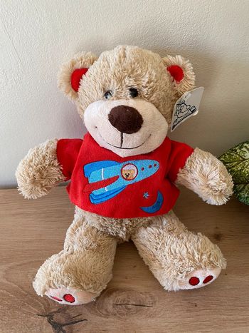 Doudou peluche ours beige pull rouge fusée lune bleu maxita neuf