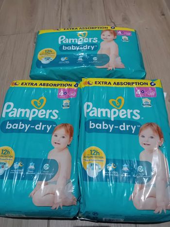 Couches pampers baby-dry taille 4+. Paquets plastique 