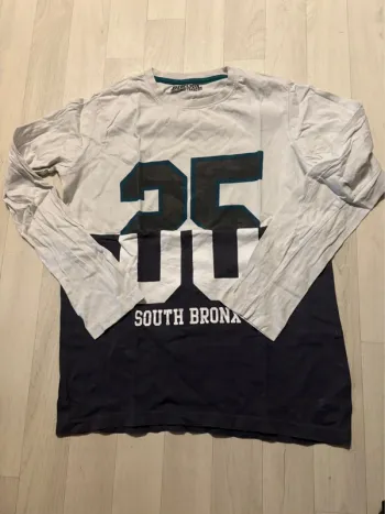 T-shirt manches longues bikool 14 ans très bon état
